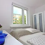 Aj *